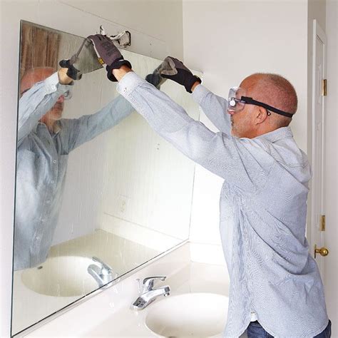 removing bathroom mirror glue